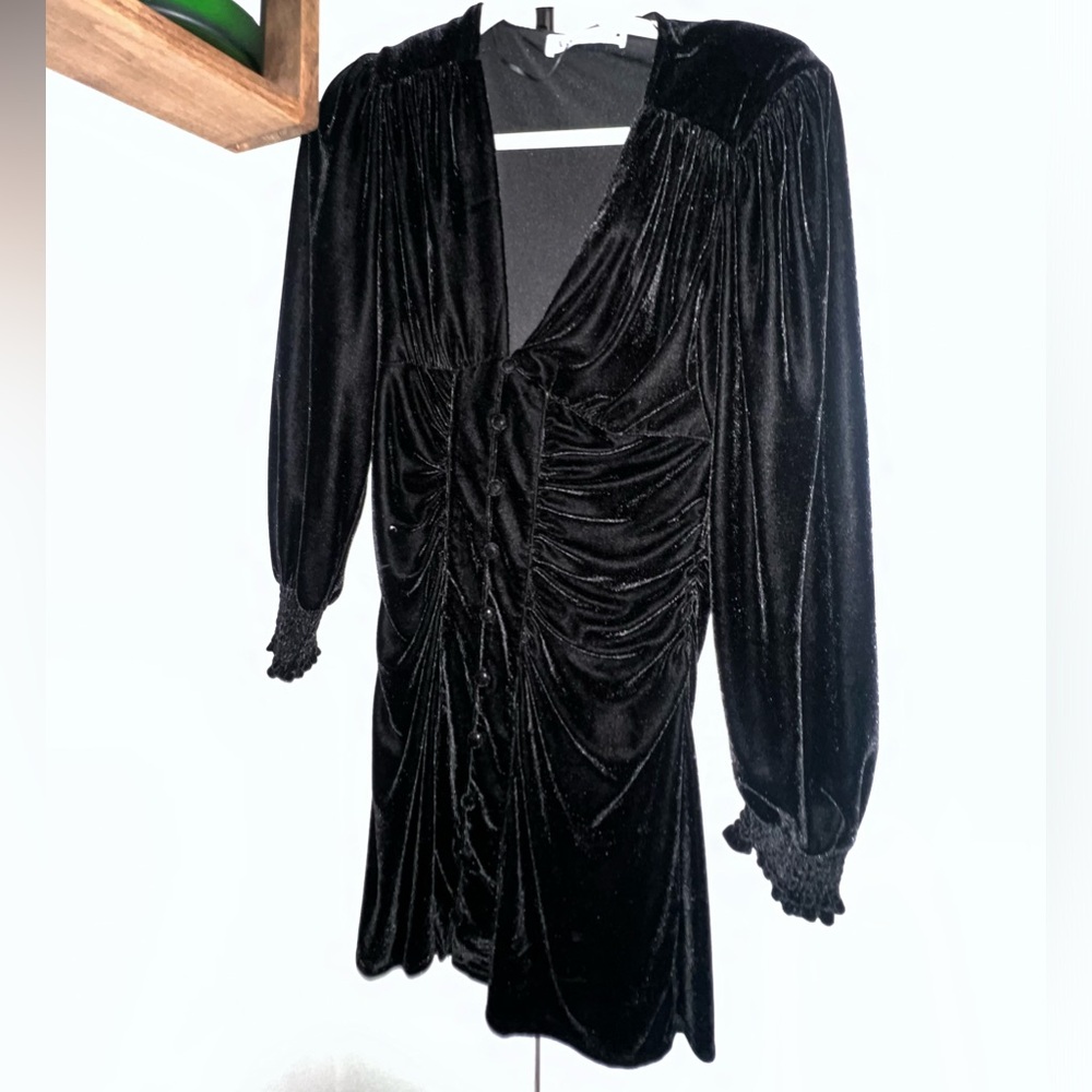 Zara mini dress. Front closure with buttons. Elastic sleeves. Shoulder padding